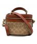 COACH（コーチ）の古着「トレイルバック シグネチャー」｜ブラウン