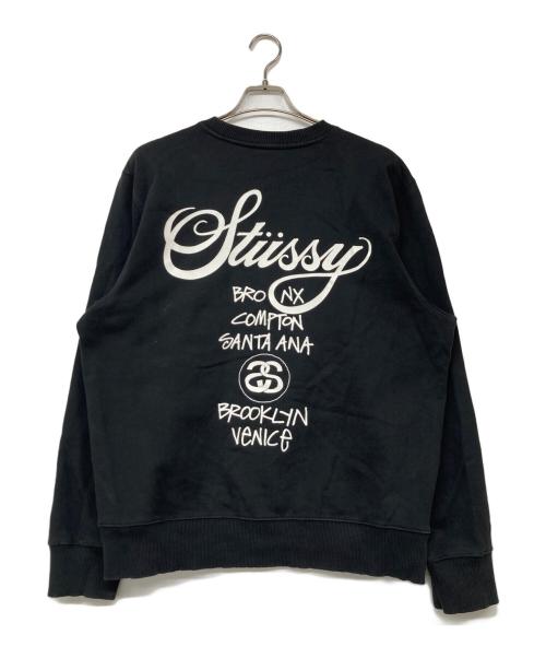 stussy（ステューシー）stussy (ステューシー) ワールドツアー プリントスウェット ブラック サイズ:Mの古着・服飾アイテム