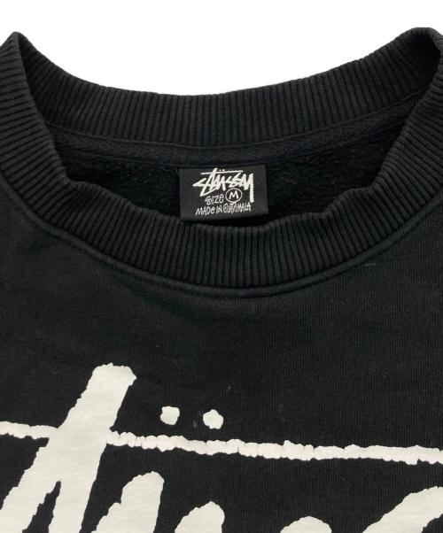 stussy（ステューシー）stussy (ステューシー) ワールドツアー プリントスウェット ブラック サイズ:Mの古着・服飾アイテム