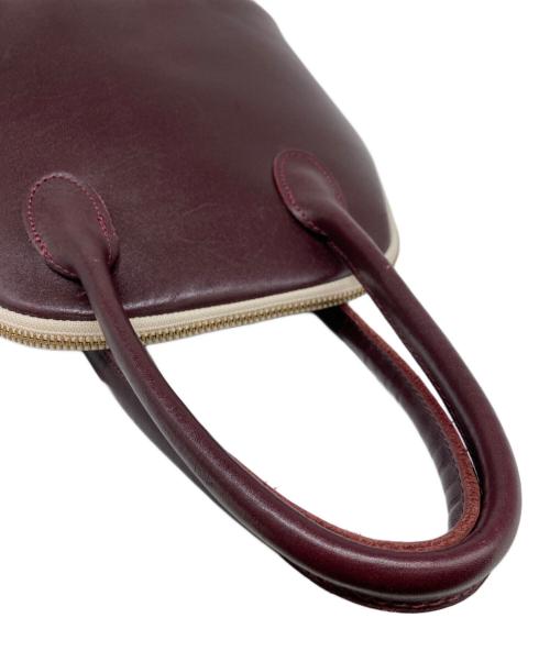 TIDE WAY（タイドウェイ）TIDE WAY (タイドウェイ) ラウンドボストンバッグ ボルドーの古着・服飾アイテム