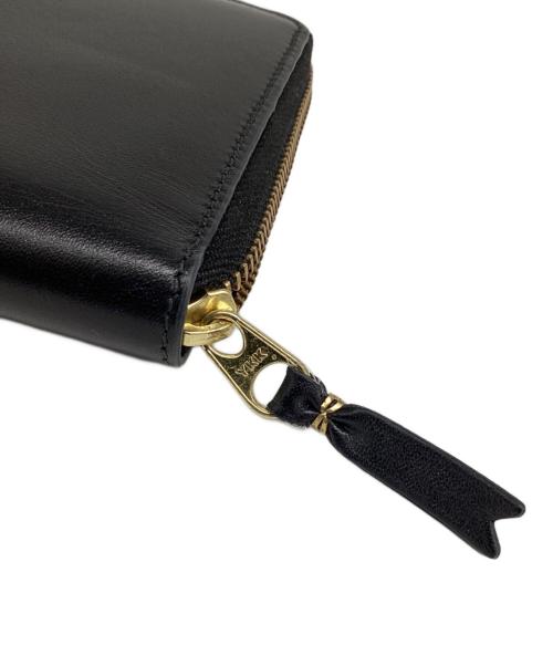 COMME des GARCONS（コムデギャルソン）COMME des GARCONS (コムデギャルソン) ラウンドジップウォレット ブラックの古着・服飾アイテム