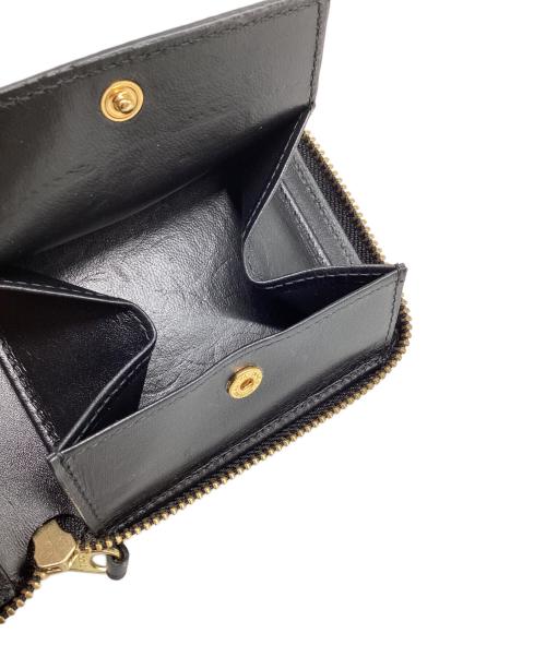 COMME des GARCONS（コムデギャルソン）COMME des GARCONS (コムデギャルソン) ラウンドジップウォレット ブラックの古着・服飾アイテム
