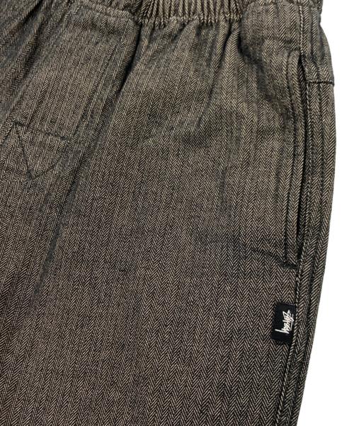 stussy（ステューシー）stussy (ステューシー) ヘリンボーンイージーパンツ ブラウン サイズ:Sの古着・服飾アイテム