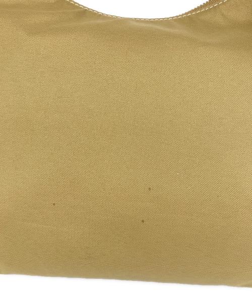 TOUT Y EST（トゥティエ）TOUT Y EST (トゥティエ) SAC CANOT TOILE SMALL カーキの古着・服飾アイテム