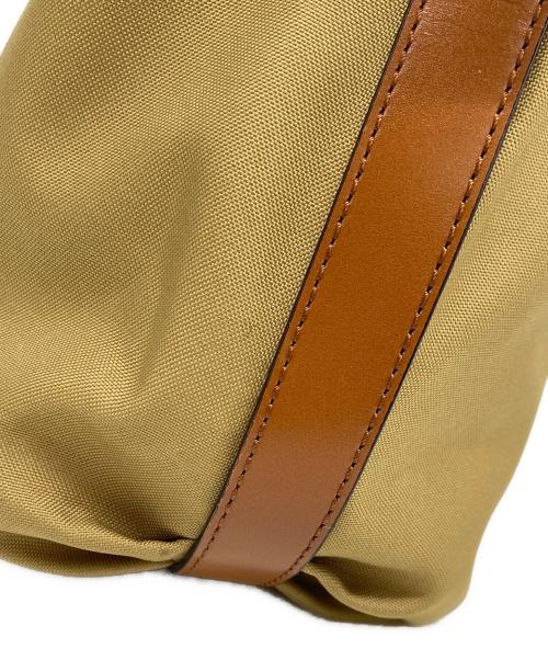 TOUT Y EST（トゥティエ）TOUT Y EST (トゥティエ) SAC CANOT TOILE SMALL カーキの古着・服飾アイテム