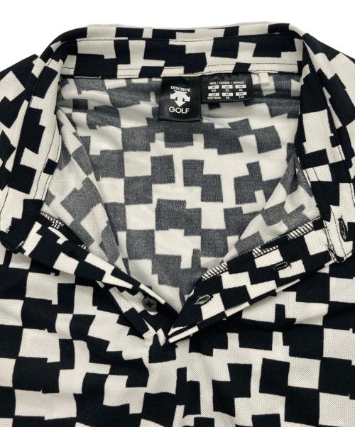 DESCENTE GOLF（デサントゴルフ）DESCENTE GOLF (デサントゴルフ) 総柄ポロシャツ ホワイト×ブラック サイズ:XOの古着・服飾アイテム