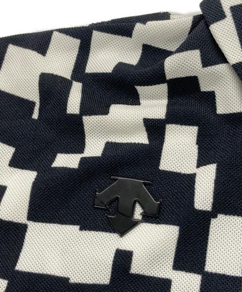DESCENTE GOLF（デサントゴルフ）DESCENTE GOLF (デサントゴルフ) 総柄ポロシャツ ホワイト×ブラック サイズ:XOの古着・服飾アイテム