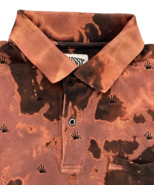 stussy（ステューシー）stussy (ステューシー) ブリーチデザインポロシャツ オレンジ サイズ:MEDIUMの古着・服飾アイテム