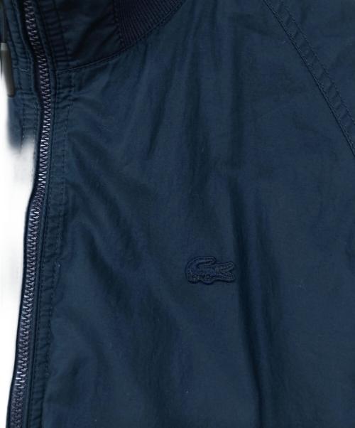 LACOSTE（ラコステ）LACOSTE (ラコステ) 防風・撥水タンカースジャケット ネイビー サイズ:US Sの古着・服飾アイテム