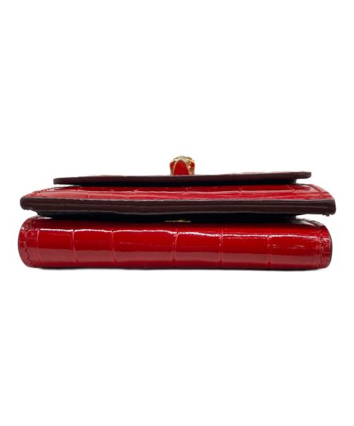 ALEXANDER McQUEEN（アレキサンダーマックイーン）ALEXANDER McQUEEN (アレキサンダーマックイーン) スカル3つ折り財布 レッドの古着・服飾アイテム