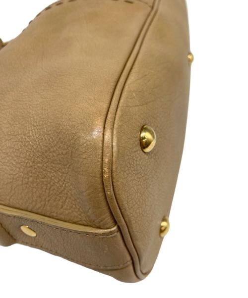 Yves Saint Laurent（イヴサンローラン）Yves Saint Laurent (イヴサンローラン) ミューズハンドバッグ ベージュの古着・服飾アイテム