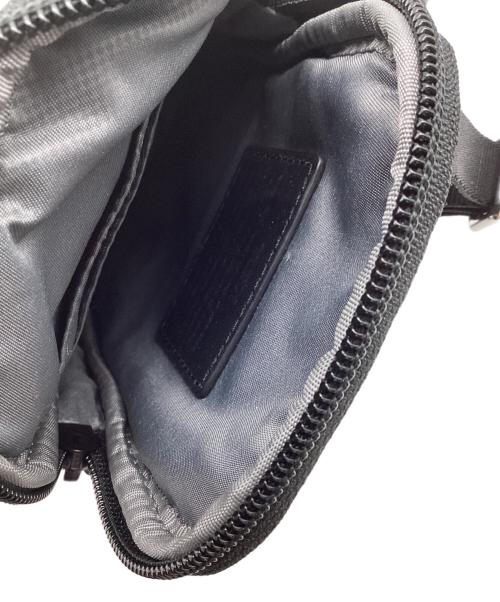 TUMI（トゥミ）TUMI (トゥミ) ショルダーポーチ ブラックの古着・服飾アイテム