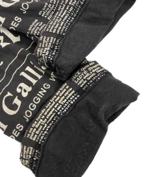 JOHN GALLIANO（ジョンガリアーノ）JOHN GALLIANO (ジョンガリアーノ) ニュースペーパー ジップフーディ ブラック サイズ:Mの古着・服飾アイテム