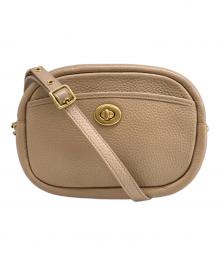 COACH（コーチ）の古着「カメラバッグ」｜ベージュ