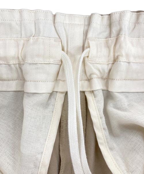 NO CONTROL AIR（ノーコントロールエアー）NO CONTROL AIR (ノーコントロールエアー) 追撚ポリエステル・ツイルワイドパンツ ベージュ サイズ:XSの古着・服飾アイテム