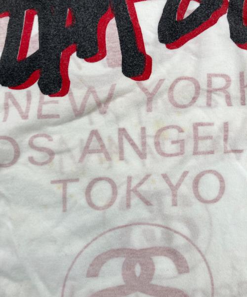 stussy（ステューシー）stussy (ステューシー) 00's world tour ラグランカットソー レッド×ホワイト サイズ:XLの古着・服飾アイテム