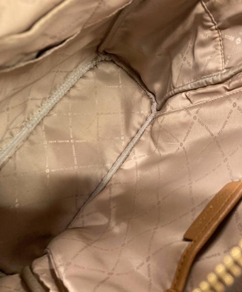 MICHAEL KORS（マイケル・コース）MICHAEL KORS (マイケル・コース) MK柄バックパック リュック ブラウンの古着・服飾アイテム