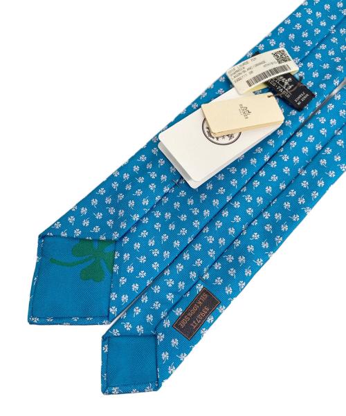 HERMES（エルメス）HERMES (エルメス) シャムロック クローバー柄ネクタイ スカイブルー サイズ:ONE SIZEの古着・服飾アイテム