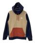Patagonia（パタゴニア）の古着「ステッカー・アップライザル・フーディ」｜ブラウン