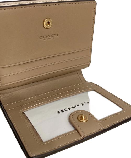 COACH（コーチ）COACH (コーチ) スナップ ウォレット・フローラル プリント アイボリーの古着・服飾アイテム