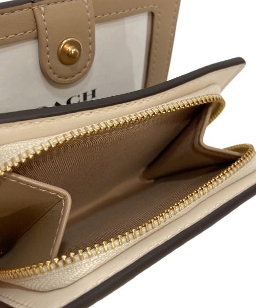 COACH（コーチ）COACH (コーチ) スナップ ウォレット・フローラル プリント アイボリーの古着・服飾アイテム