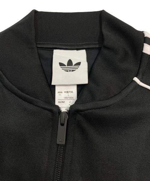 adidas（アディダス）adidas (アディダス) アディカラー クラシック ルーズ トラックトップ ブラック サイズ:XLの古着・服飾アイテム