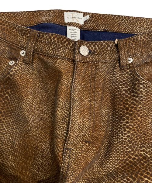 ck Calvin Klein（シーケーカルバンクライン）ck Calvin Klein (シーケーカルバンクライン) スネークプリントパンツ ブラウン サイズ:10の古着・服飾アイテム