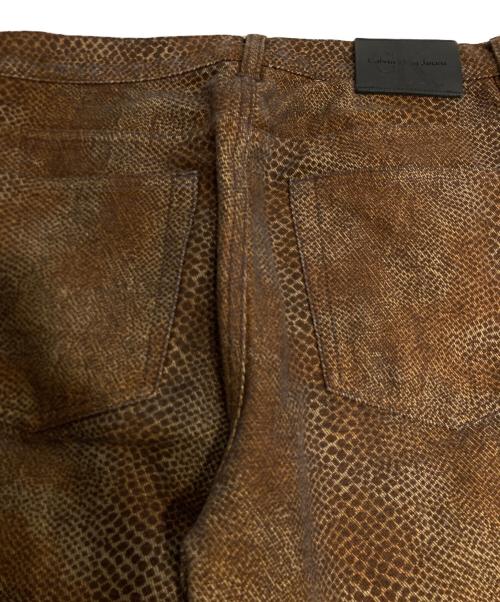 ck Calvin Klein（シーケーカルバンクライン）ck Calvin Klein (シーケーカルバンクライン) スネークプリントパンツ ブラウン サイズ:10の古着・服飾アイテム