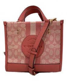 COACH（コーチ）の古着「デンプシー トート 22」｜ピンク