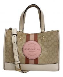 COACH（コーチ）の古着「デンプシーキャリーオール2WAYショルダーバッグ」｜ベージュ