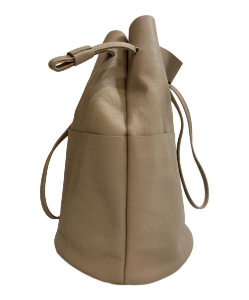 evam eva（エヴァムエヴァ）evam eva (エヴァムエヴァ) drawstring bag ドローストリングバッグ ベージュ サイズ:Sの古着・服飾アイテム