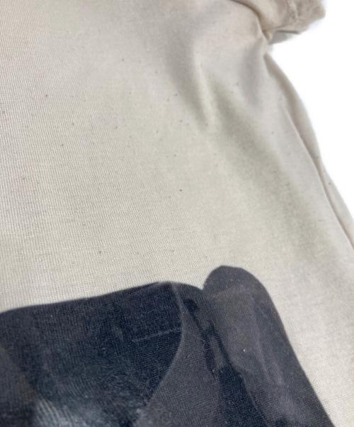 ADSB ANDERSSON BELL（アンダースンベル）ADSB ANDERSSON BELL (アンダースンベル) グラフィック ハーネス プリント Tシャツ ベージュ サイズ:Sの古着・服飾アイテム