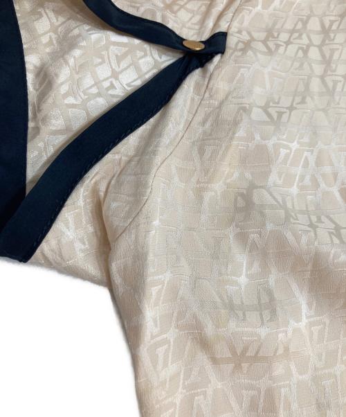 LOUIS VUITTON（ルイ ヴィトン）LOUIS VUITTON (ルイ ヴィトン) シルク フレンチスリーブブラウス アイボリー サイズ:38の古着・服飾アイテム