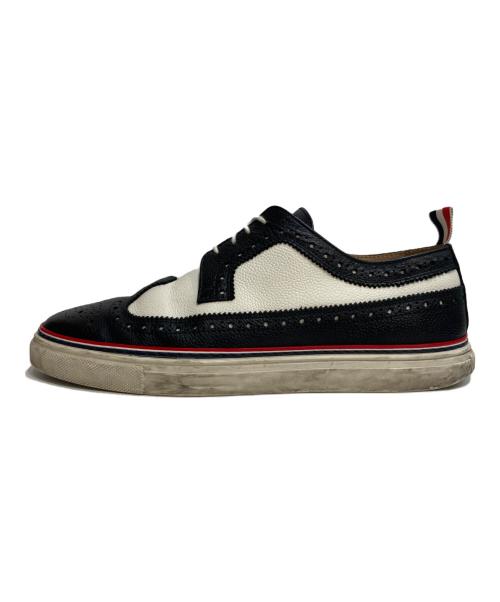 Thom Browne（トムブラウン）Thom Browne (トムブラウン) ウィングチップスニーカー ブラック×ホワイト サイズ:US9の古着・服飾アイテム