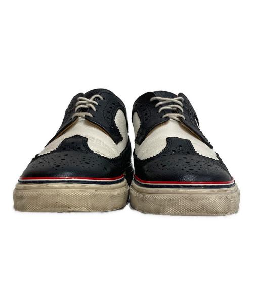 Thom Browne（トムブラウン）Thom Browne (トムブラウン) ウィングチップスニーカー ブラック×ホワイト サイズ:US9の古着・服飾アイテム