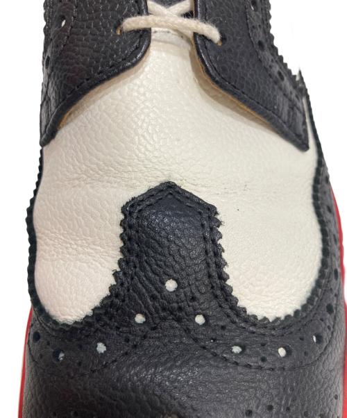 Thom Browne（トムブラウン）Thom Browne (トムブラウン) ウィングチップスニーカー ブラック×ホワイト サイズ:US9の古着・服飾アイテム