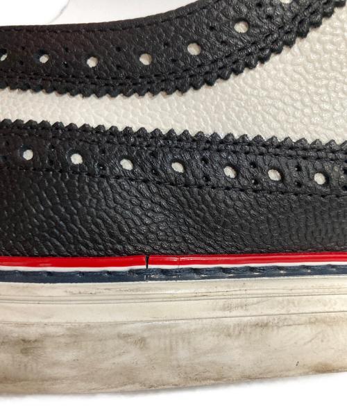 Thom Browne（トムブラウン）Thom Browne (トムブラウン) ウィングチップスニーカー ブラック×ホワイト サイズ:US9の古着・服飾アイテム