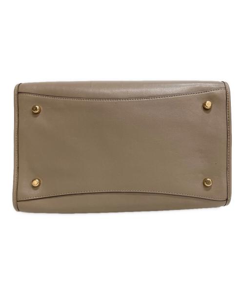 COACH（コーチ）COACH (コーチ) パイソンハンドル 2WAYバッグ ベージュ×ネイビーの古着・服飾アイテム
