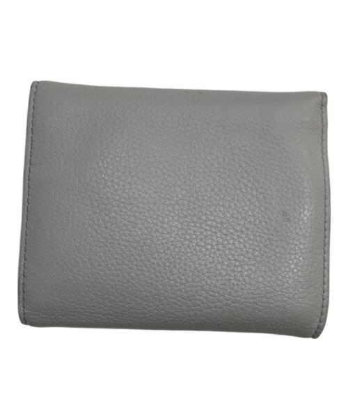MIU MIU（ミュウミュウ）MIU MIU (ミュウミュウ) ヴィッテロダイノレザーフラップ付折り財布 グレーの古着・服飾アイテム