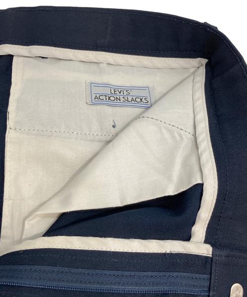 LEVI'S ACTION SLACKS（リーバイスアクションスラックス）LEVI'S ACTION SLACKS (リーバイスアクションスラックス) テーパードパンツ ブラック サイズ:W34の古着・服飾アイテム