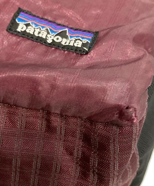 Patagonia（パタゴニア）Patagonia (パタゴニア) ライトウェイト・トラベル・クーリエ パープルの古着・服飾アイテム