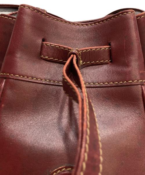 Cartier（カルティエ）Cartier (カルティエ) マストライン 巾着ショルダーバッグ ブラウンの古着・服飾アイテム