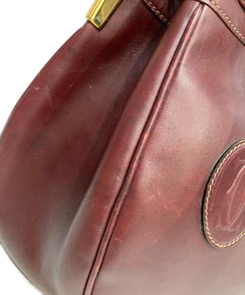 Cartier（カルティエ）Cartier (カルティエ) マストライン 巾着ショルダーバッグ ブラウンの古着・服飾アイテム
