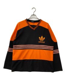 adidas（アディダス）の古着「Vネックカットソー」｜オレンジ×ブラック