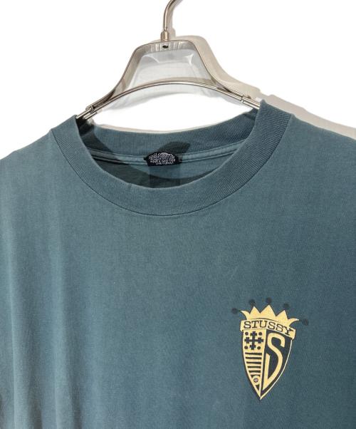 stussy（ステューシー）stussy (ステューシー) クラウンエンブレムプリントTシャツ ブルー サイズ:Lの古着・服飾アイテム