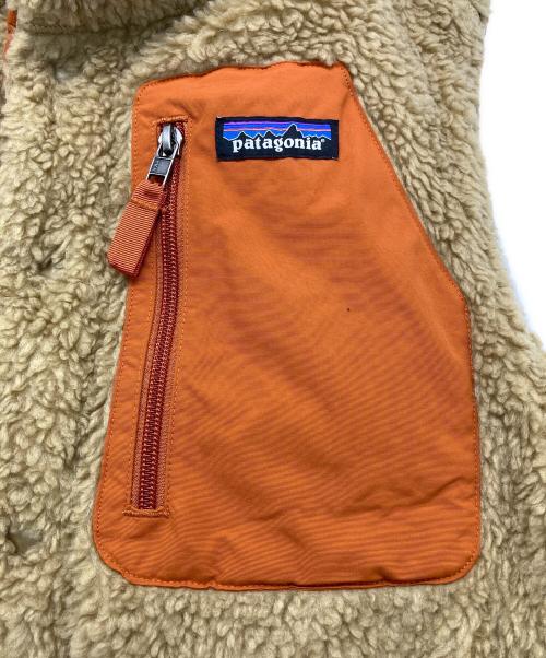 Patagonia（パタゴニア）Patagonia (パタゴニア) リバーシブル・ビビー・ダウン・ベスト ベージュ×オレンジ サイズ:下記参照の古着・服飾アイテム