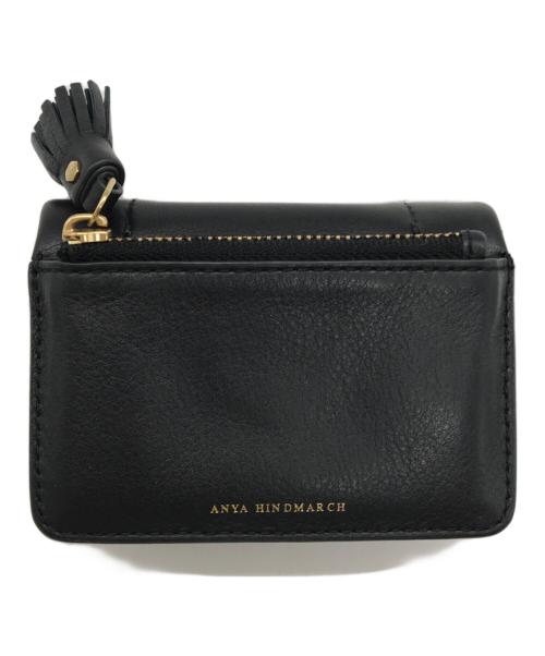 ANYA HINDMARCH（アニヤ・ハインドマーチ）ANYA HINDMARCH (アニヤハインドマーチ) ツイストリボンデザイン 三つ折財布 ブラックの古着・服飾アイテム