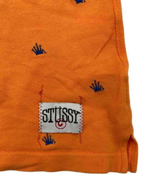 stussy（ステューシー）stussy (ステューシー) クラウン刺繍ポロシャツ オレンジ サイズ:Mの古着・服飾アイテム