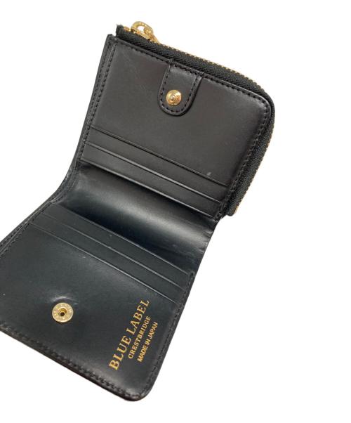 BLUE LABEL CRESTBRIDGE（ブルーレーベルクレストブリッジ）BLUE LABEL CRESTBRIDGE (ブルーレーベルクレストブリッジ) 2つ折り財布 レッドの古着・服飾アイテム