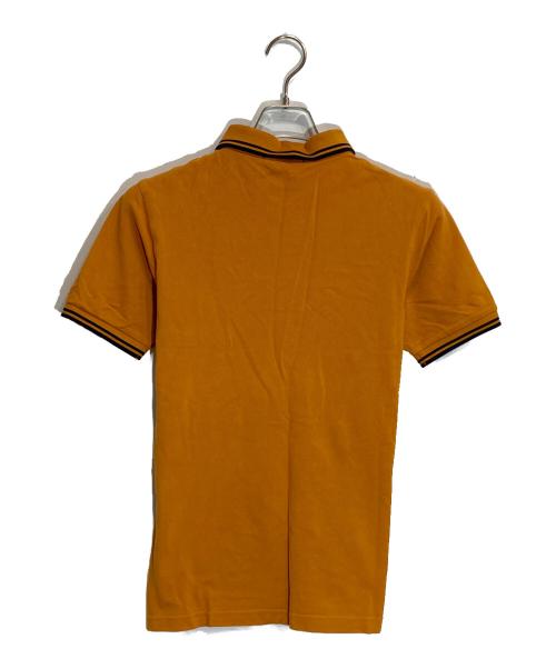 FRED PERRY（フレッドペリー）FRED PERRY (フレッドペリー) ポロシャツ オレンジ サイズ:Sの古着・服飾アイテム